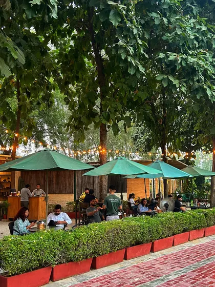 The bar and seating area on our patio, where guests can order drinks and enjoy the lively atmosphere.