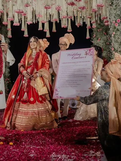 The groom reading the fun "Wedding Contract" to the guests, a unique and memorable part of their celebration.