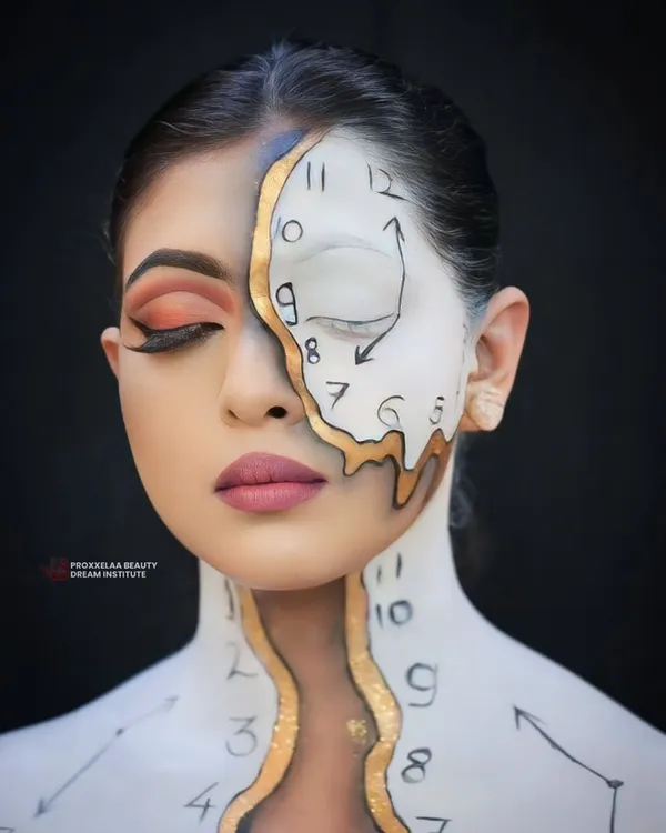 Embracing the magic of fantasy makeup. This surrealist clock-inspired look, with its melting design and intricate details, showcases the creative potential we unlock in our students.