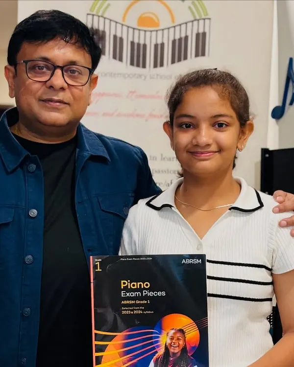 A proud moment for our student after completing her Grade 1 Piano Exam. We provide full support and materials for ABRSM exam preparation.