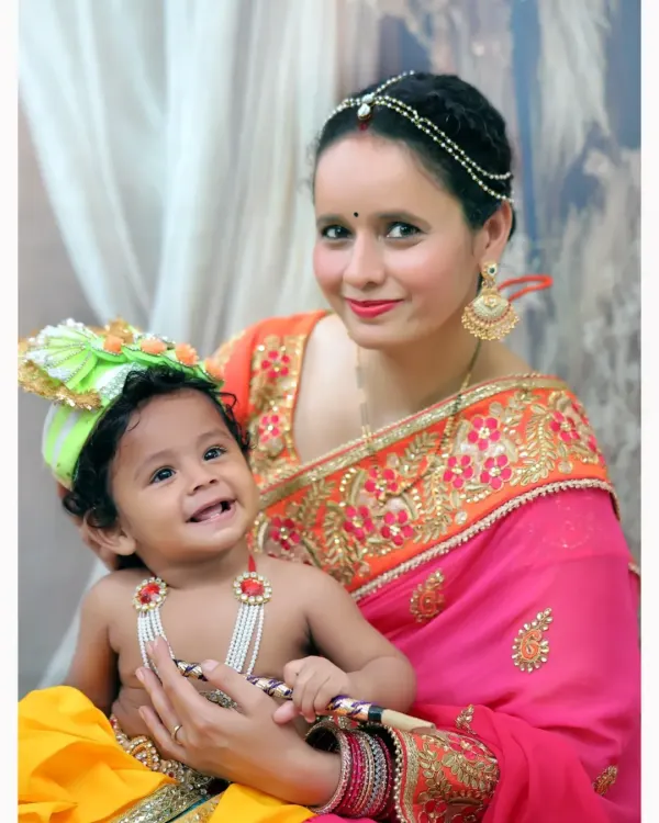A mother and her little one dressed as Krishna for a Janmashtami photoshoot. I provide traditional attire and props to make these sessions authentic and special.