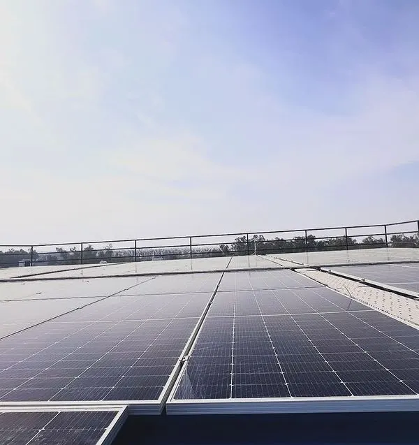 A wide view of a recently commissioned 60 KW On-Grid solar power system in New Delhi. This installation showcases our capability in handling large scale commercial projects on industrial tin shed roofs, helping businesses significantly reduce their electricity costs.