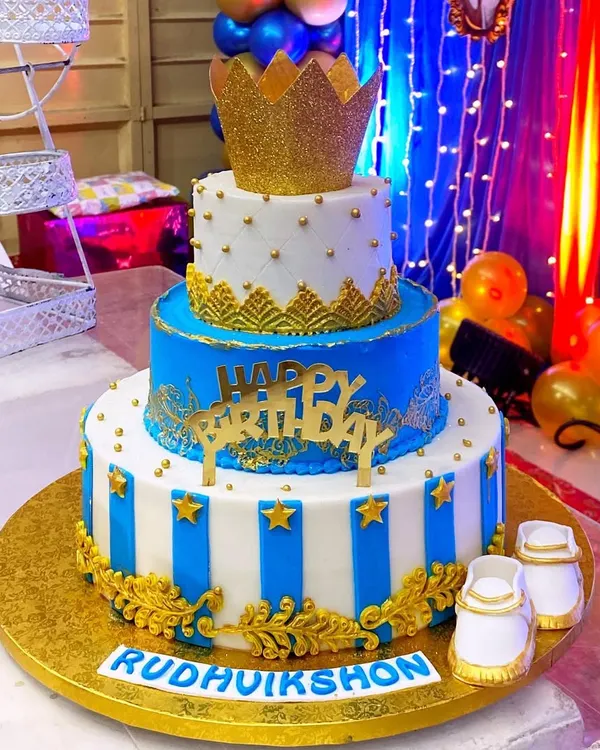 This three-tier royal prince cake was an absolute joy to create for a little one's very first birthday. I specialize in making these grand, themed cakes that become the centerpiece of your celebration, complete with handcrafted details like the fondant crown and tiny shoes.