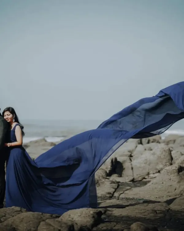 This is one of my popular pre-wedding combo sets available for rent. The navy blue gown with a dramatic flowing trail for her and a coordinating suit for him create a perfect picture.