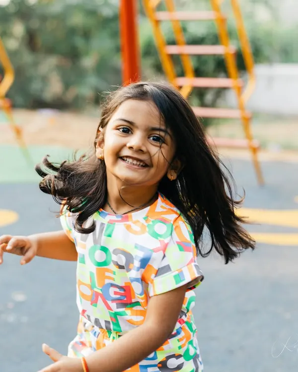 This is my daughter, my muse. Her energy and desire to run and play during her own photoshoot reminded me that the best photos come from letting children be their authentic selves.