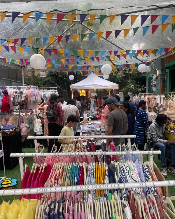 Welcome to my curated world for families! This is the heart of my event, a bustling marketplace filled with happy shoppers discovering unique, homegrown brands. I love creating this vibrant atmosphere where you can find special treasures for your little ones.