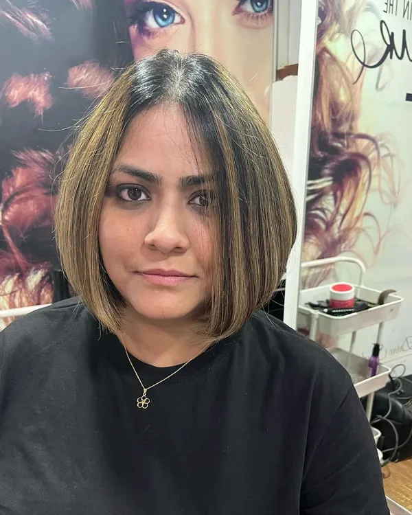 This is the result of a haircut correction. Ankita's previous bob was uneven, so I reshaped it into this beautifully layered and angled inverted bob that she originally wanted.