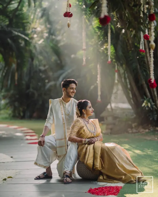 A stunning, sun-drenched portrait of a couple in a garden. The magical light and romantic pose make this a truly breathtaking image that epitomizes our style.