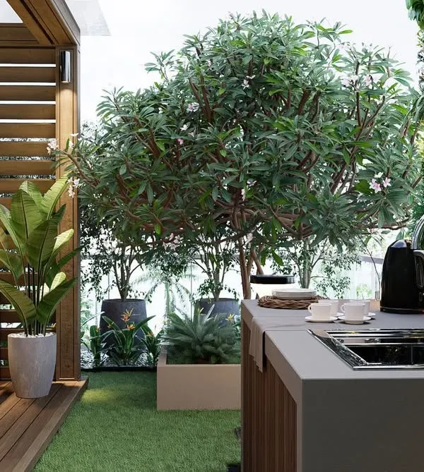 A key feature of our terrace designs is functionality. This render shows an outdoor kitchen and bar area seamlessly integrated with planters and a vertical garden, making it perfect for hosting.