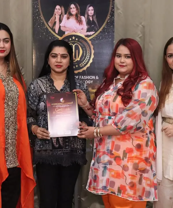 A proud moment for one of my students during our certification ceremony. She is now officially certified and ready to take on the beauty industry.