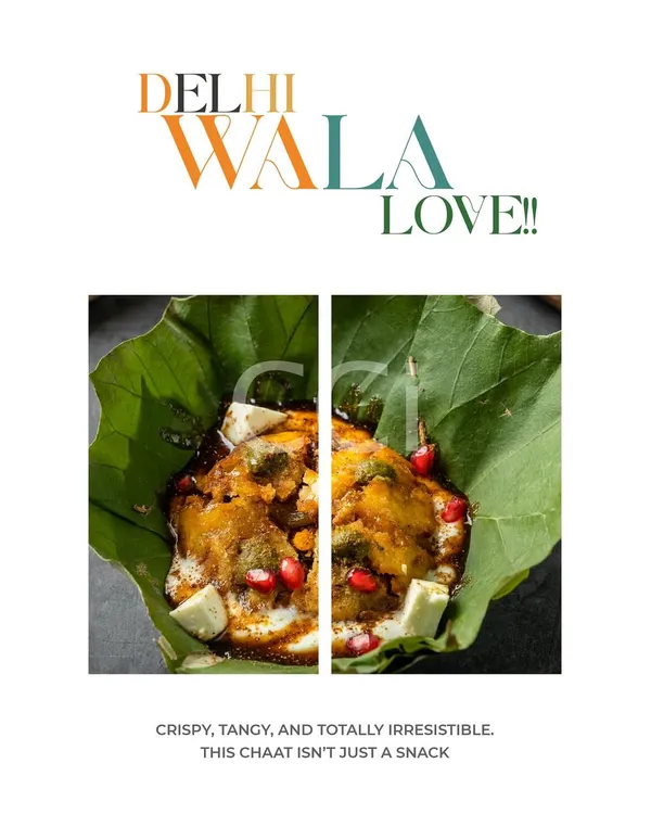 This is our "Delhi Wala Love" on a plate. A classic chaat, served in a traditional leaf bowl but elevated with fresh pomegranate seeds and paneer, capturing the crispy, tangy, and irresistible flavors of Delhi street food.