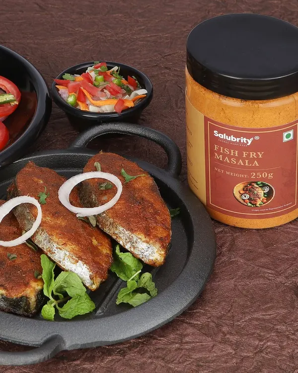 This image perfectly captures our ability to bridge the gap between a packaged product and its delicious final form. We styled and photographed this appetizing plate of fried fish alongside the client's Fish Fry Masala, creating a complete story for e-commerce and advertising use.