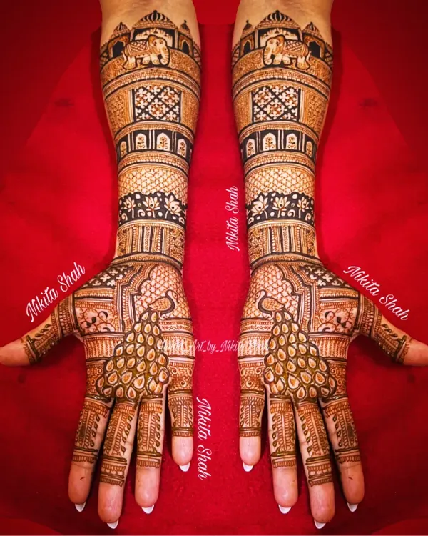This is a full-coverage bridal mehendi for a client's relative, featuring majestic elephants and graceful peacocks. I specialize in creating these dense, traditional Indian designs that are perfect for the main family members at a wedding.