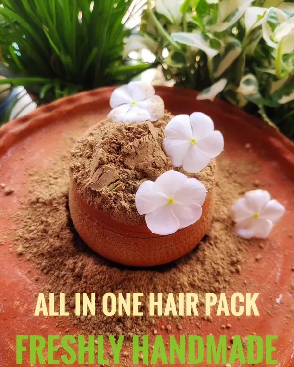 This is my All-in-One Hair Pack, a completely herbal powder that gives your hair a spa-like treatment right at home. I've packed it with natural ingredients to deeply hydrate, soften hair, and fight frizz.
