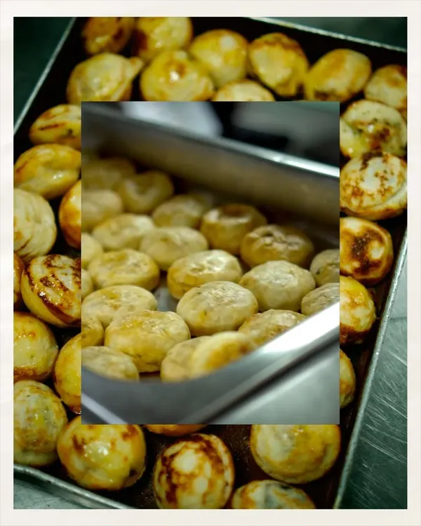 A tray of freshly baked Edamame Kachoris, ready to be served at my 'Modern Luxury' dinner series in Delhi.