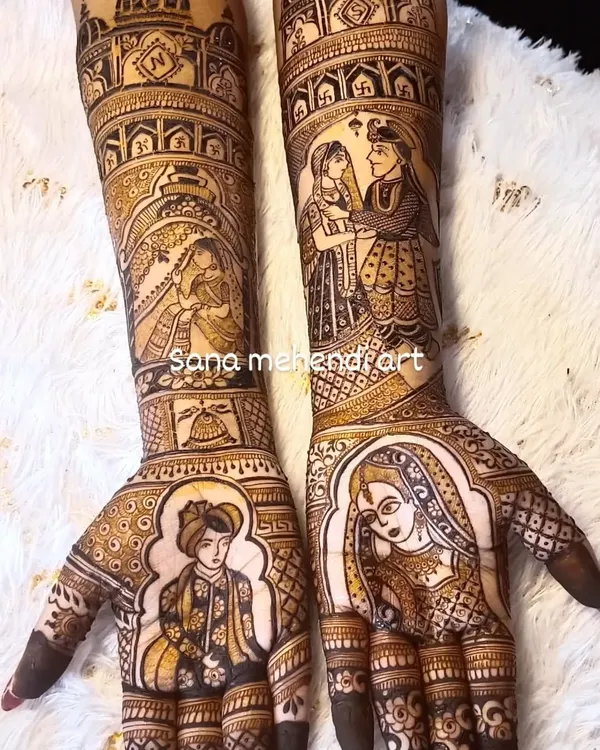 For me, bridal mehendi is a canvas for your love story. This full bridal design features detailed portraits of the bride and groom, surrounded by traditional motifs and scenes from their wedding rituals, creating a piece of art that is deeply personal and unique.