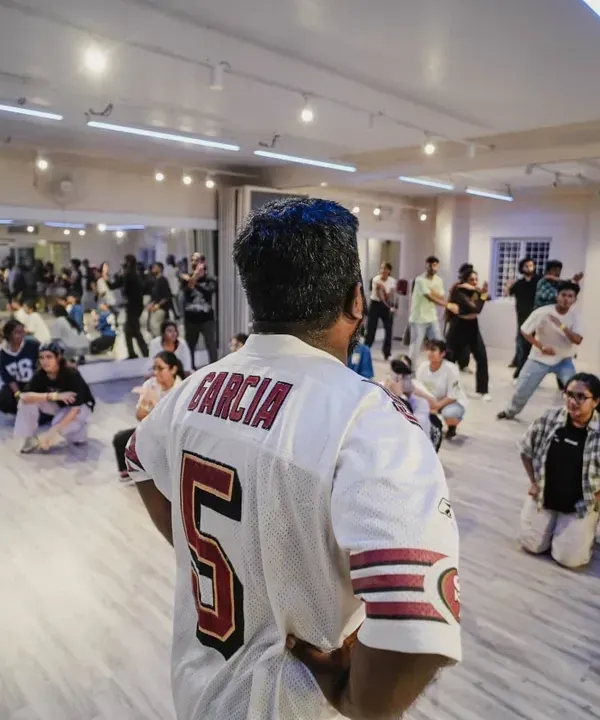 This is the energy we bring to every class. Here, our instructor guides a packed workshop during our Collab Series 2.0, showing the focus and passion that fuels our community. It's more than just steps; it's about finding your flow together.