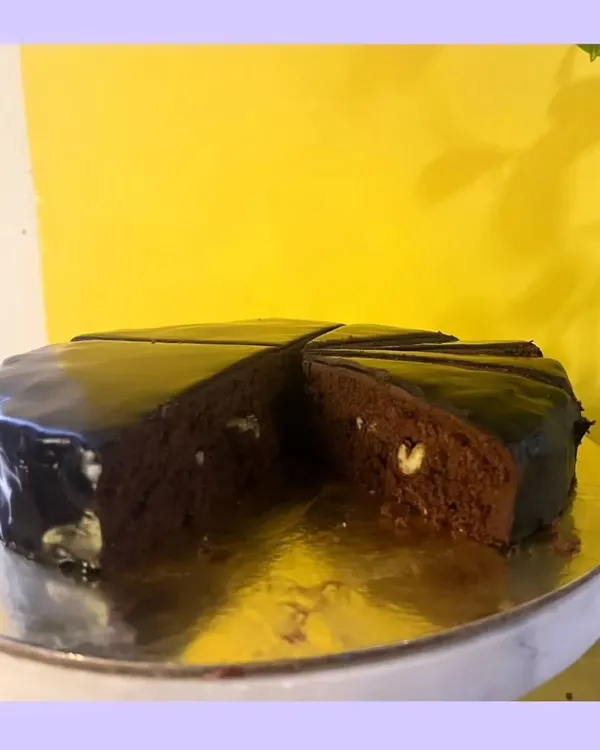 This is my classic chocolate truffle cake, a true symphony of rich cocoa. With its velvety texture and deep, decadent layers, every slice is an unforgettable experience for any chocolate lover.