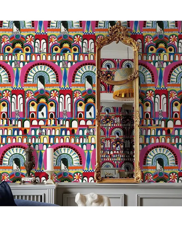 For the client who is not afraid of colour, the 'La Dolce Vita' wallpaper is a celebration of life. Its vibrant palazzos and playful motifs can transform a simple wall into an explosion of joy and energy. I use such designs to make a powerful statement.