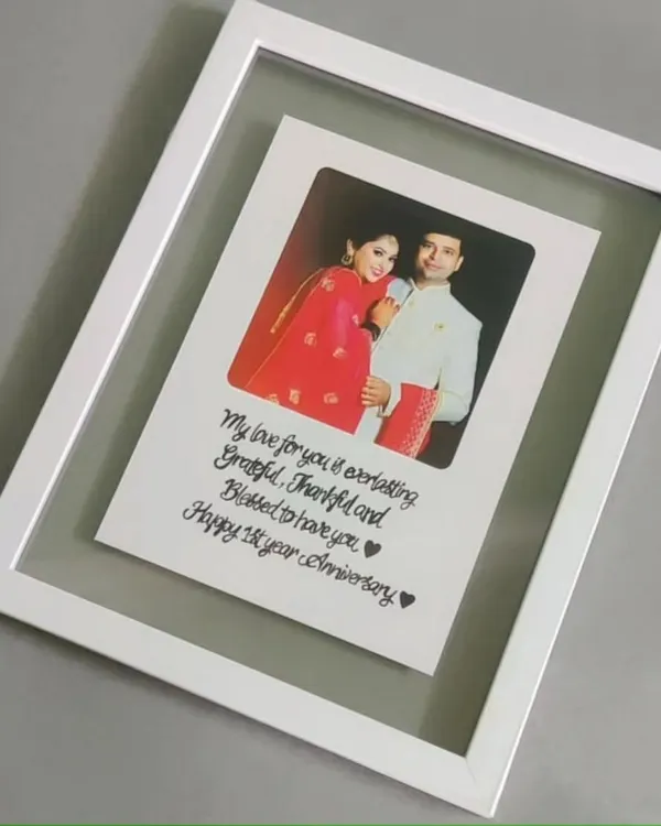My signature floating acrylic frame is a customer favorite. Your photo and a custom handwritten message appear to float inside the clean white frame, making it a perfect anniversary or wedding gift.