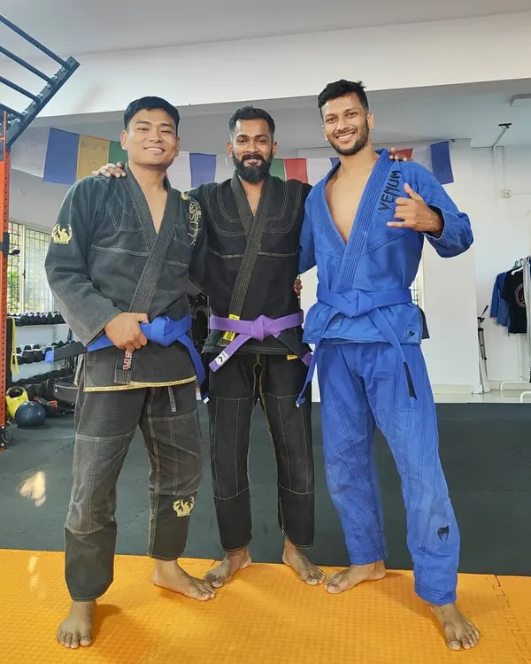 My first colored belts, Jitendra and Long. These two deserve their blue belts for their loyalty, hard work, and success. We don't build sandbaggers here; we build skilled martial artists.