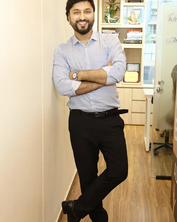 A full-length photo of me at DermaSky Clinic. I designed this space to be both professional and comfortable for every person who walks through our doors.
