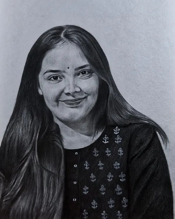 A graphite pencil portrait capturing a gentle smile. I focus on creating a soft, realistic texture for both skin and hair.