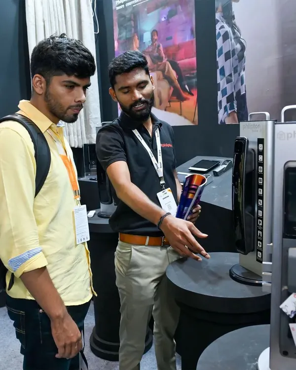 Here I am at the Smart Home Expo 2024, demonstrating the features of one of my advanced smart locks to an interested visitor. It's always great to share my passion for smart technology in person.