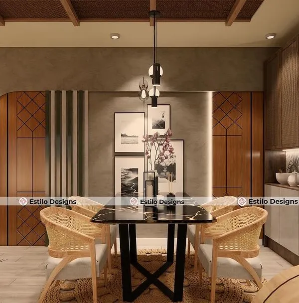 This dining area for a 4 BHK home in Prestige Jindal City is designed with Indian roots in mind. The space features warm wood tones, cane chairs, and intricate paneling, creating a perfect setting for family meals.