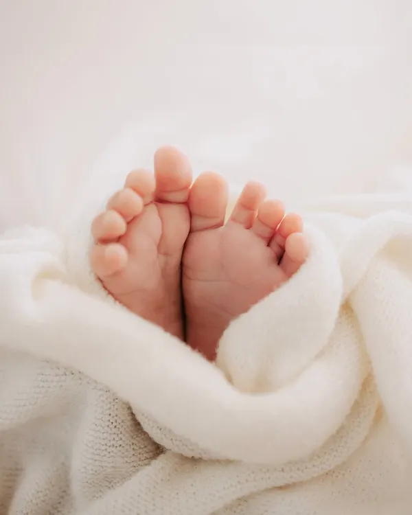 The ten tiniest toes. We take time in every newborn session to capture these precious details that you'll cherish forever.