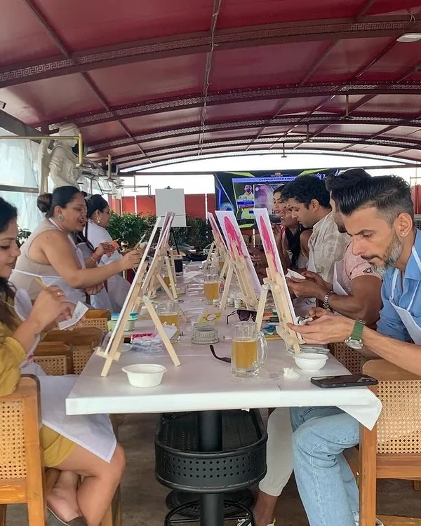 A perfect setup for a weekend paint session. We line up the easels, paints, and drinks so you can just settle in and get creative. This is your chance to break from the routine and make some art.
