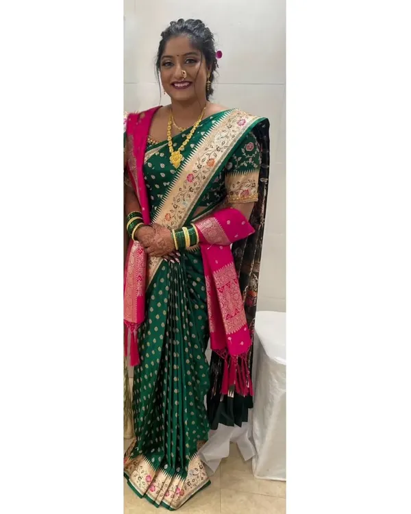 Our client looking lovely in her pre-pleated Banarasi Maharashtrian saree for her engagement. The drape is styled traditionally with a shawl, and our service ensured it was easy for her to wear.