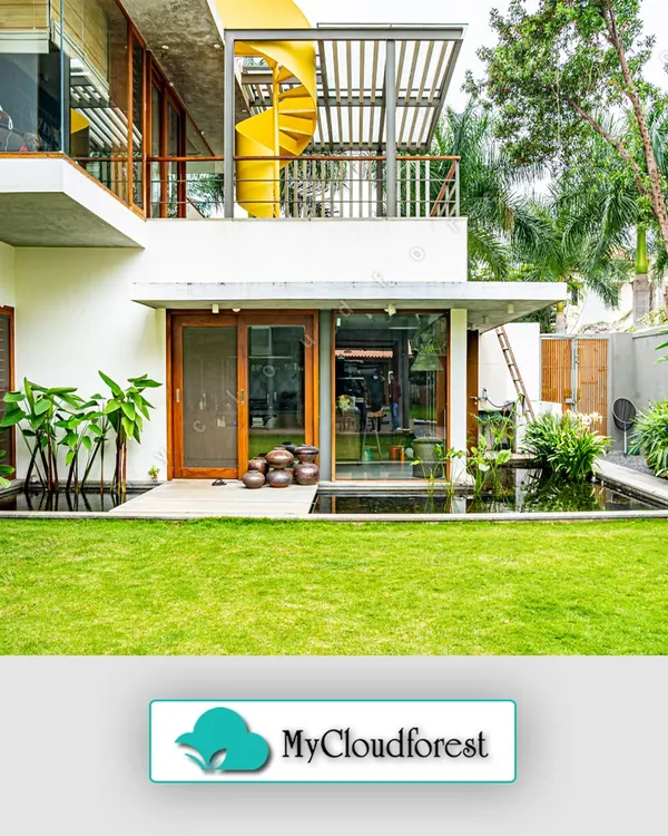 I designed this space to seamlessly blend modern architecture with the natural environment. The clean lines of the home are softened by a pristine lawn and a tranquil water feature, creating a private retreat that feels both sophisticated and serene.