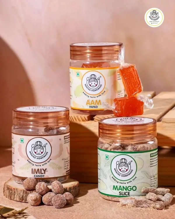 Our classic trio for every craving. This shot features our tangy Imly Candy, sweet Orange Aam Papad, and chewy Dried Mango Slices, each offering a distinct taste of home.