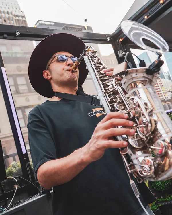 The magic of a live saxophone layered over my DJ set during a sundowner in New York City. This fusion creates a sophisticated and soulful vibe.