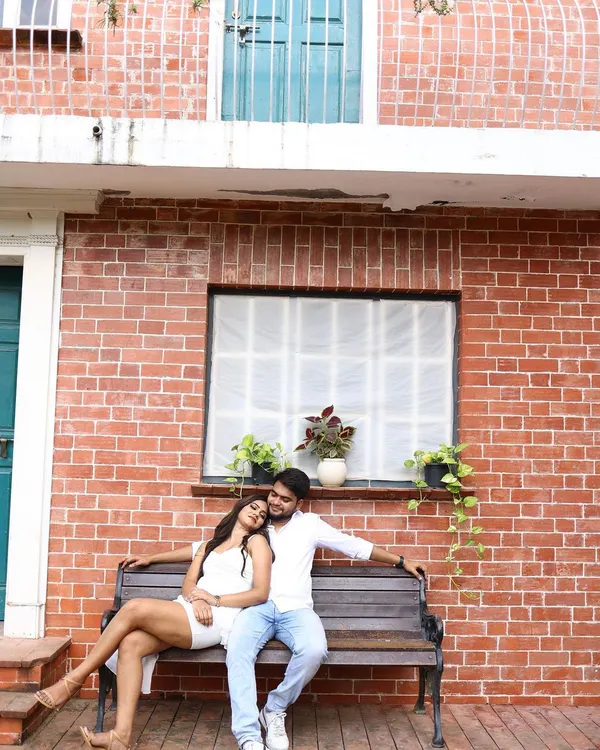 A romantic moment from a pre-wedding shoot. Our client looks beautiful in our simple and elegant white high-low dress, perfect for creating timeless memories.