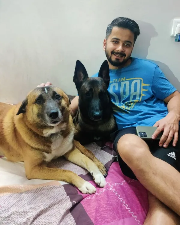 This is my team. Sitting here with Brownie and Jax is my happy place. They are my constant companions, my training partners, and the reason I do what I do.