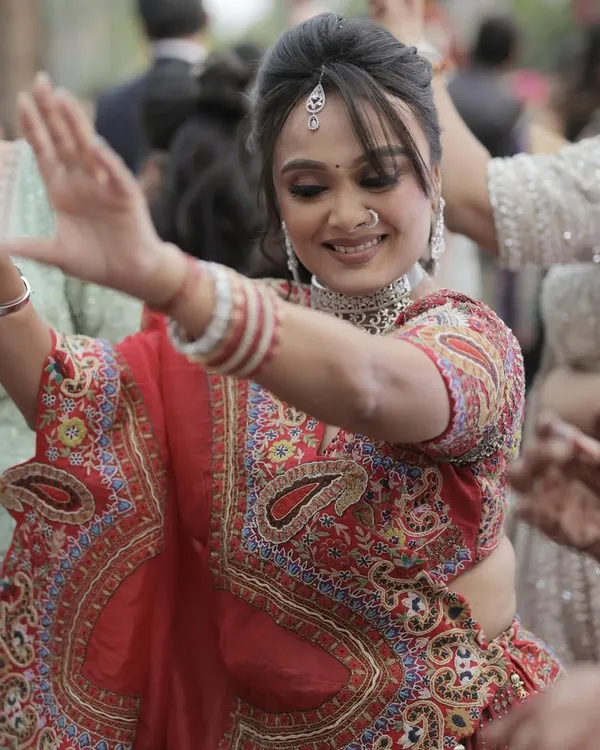 A candid shot of my client dancing and enjoying a family wedding. My makeup is designed to be long-lasting and picture-perfect.