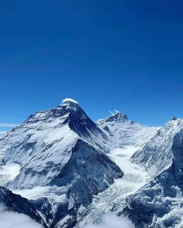 A breathtaking view of Mount Everest, the world's highest peak. Our 14-day Everest Base Camp trek takes you right to the foot of this giant.