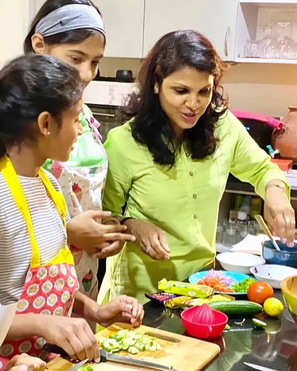 Teaching young people the power of food is one of the best gifts we can give them. Here I am, guiding two enthusiastic learners through the steps of preparing a fresh, vibrant salad.