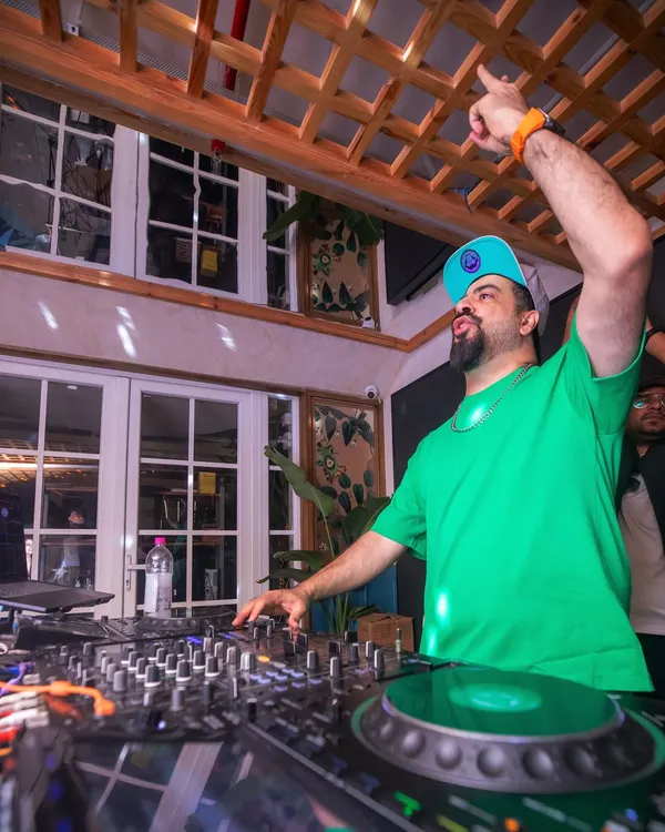 In my element at Monkey Bar, pointing to the crowd and feeling the energy. This is where I belong.
