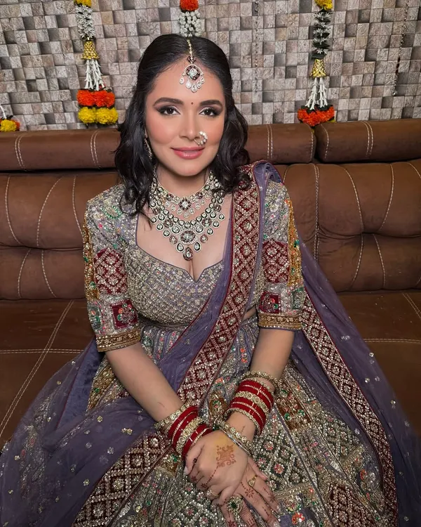 One of my beautiful clients looking absolutely radiant in a unique lavender-grey rental lehenga for her special day. I love helping you find a look that is uniquely you.