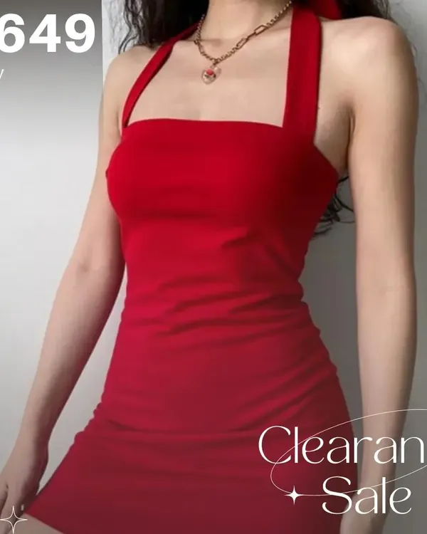 A classic red halter neck mini dress, now available at a special clearance price. Perfect for parties and nights out.