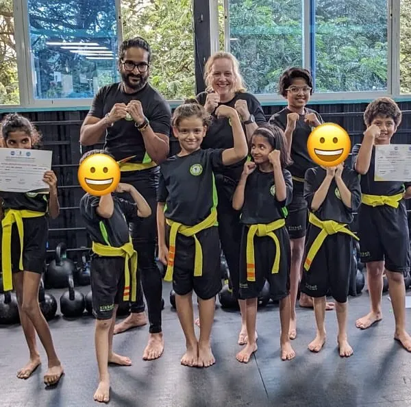 A proud moment for our new yellow belts. This group photo captures the joy of achievement after a successful grading, showcasing the discipline and passion of our little and junior Kikkers.