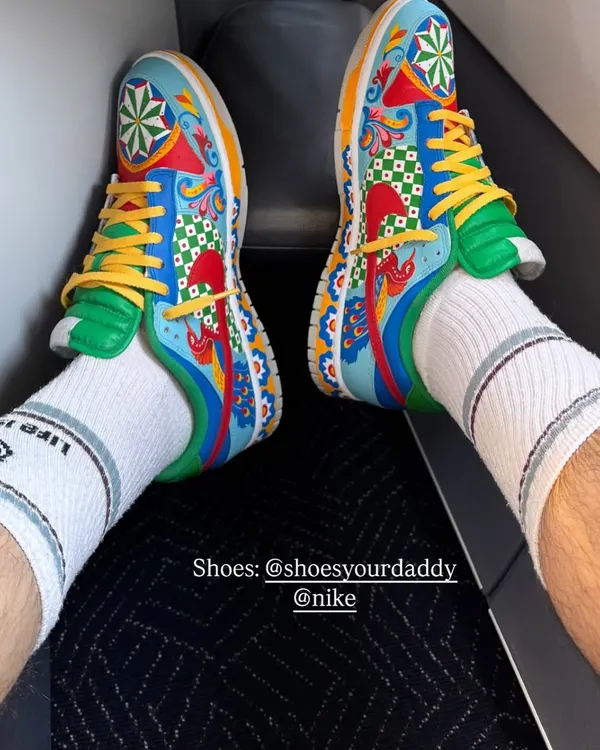 A custom pair of Nike Dunks I painted for the talented musician Rishabh Rikhi Ram Sharma, seen here on a flight. The design is inspired by traditional Indian motifs to reflect his unique blend of classical and modern music.