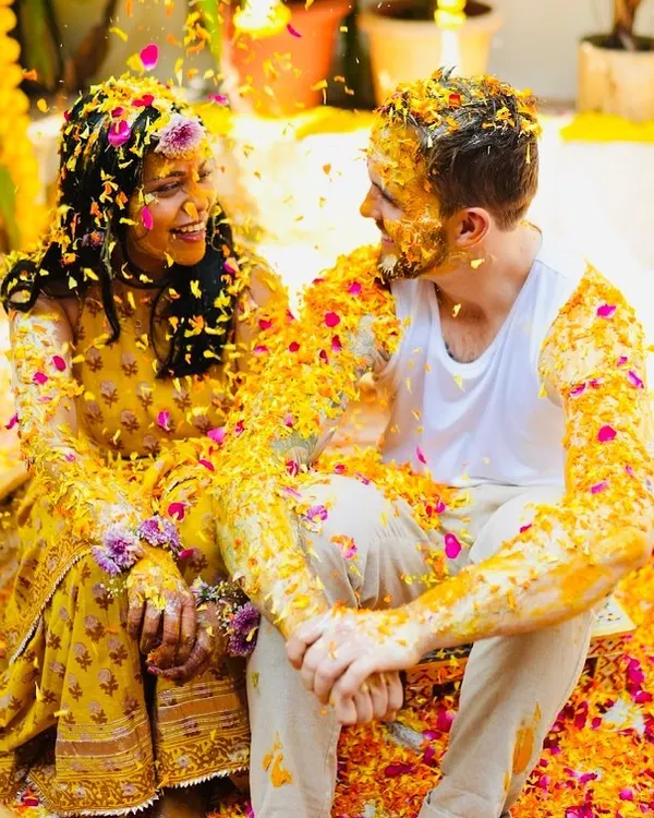 The Phoolon ki Holi is one of my favorite pre-wedding events. It's pure, uninhibited joy, as seen here at Sam and Matt's haldi, where they were showered with turmeric and flower petals by their loved ones.