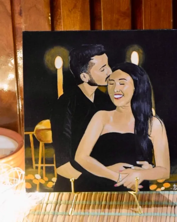 I painted this cozy couple's portrait as a custom wedding gift. It captures a warm, intimate moment, making it a truly personal and heartfelt present for the newlyweds.