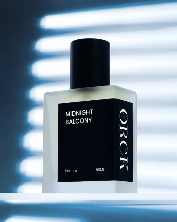 For this 'Midnight Balcony' perfume, I used creative lighting to mimic moonlight through blinds. This technique creates a dramatic, high concept visual that tells a story of mystery and elegance.