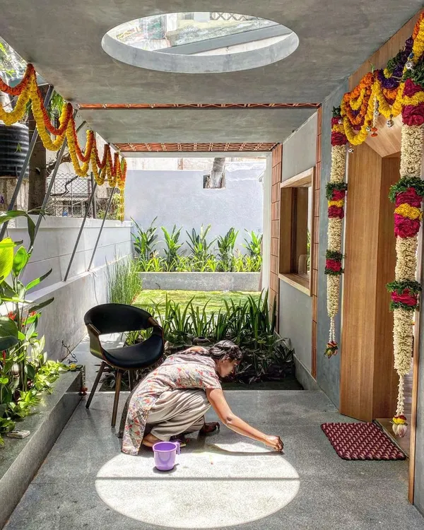 A perfect circle of sunlight from a skylight illuminates a morning ritual. This is how we design with light, creating moments of beauty and connection in everyday life.