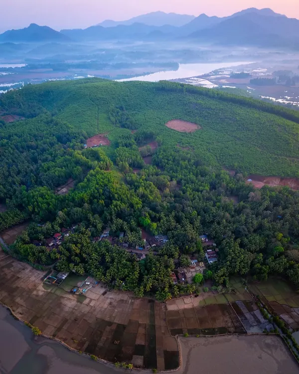 An aerial view of the fertile banks of the Aghanashini River in Uttara Kannada. This lifeline of the region originates in Sirsi and journeys 124 km to the Arabian Sea.